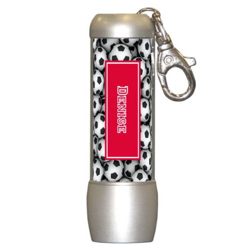 Personalized flashlight personalized with soccer balls pattern and name in bright red