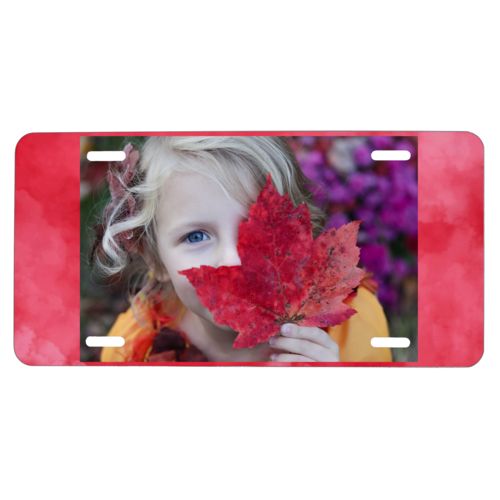 Custom license plate personalized with red cloud pattern and photo