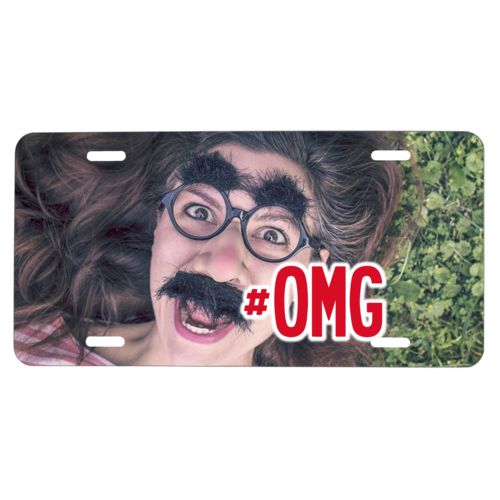 Custom license plate personalized with photo and the saying "#omg"