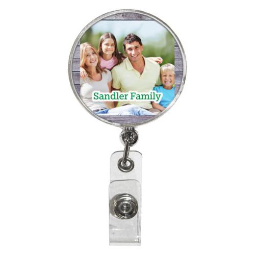 Personalized badge reel personalized with grey wood pattern and photo and the saying "Sandler Family"