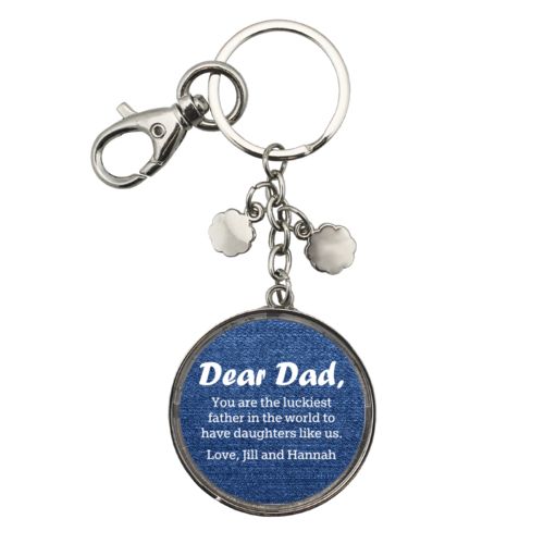 Personalized metal keychain personalized with denim industrial pattern and the saying "Dear Dad, You are the luckiest father in the world to have daughters like us. Love, Jill and Hannah"