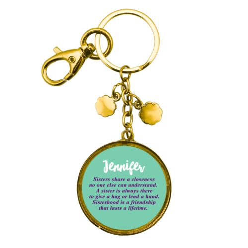 Personalized metal keychain personalized with the sayings "Sisters share a closeness no one else can understand. A sister is always there to give a hug or lend a hand. Sisterhood is a friendship that lasts a lifetime." and "Jennifer"