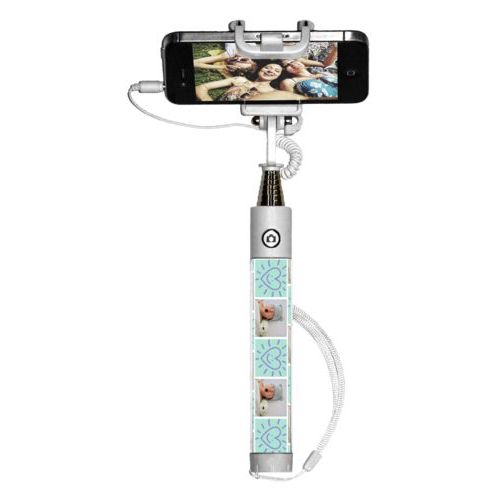 Personalized selfie stick personalized with a photo and the saying "Smiling Heart" in easter purple and mint