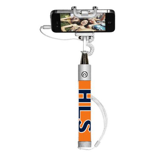 Personalized selfie stick personalized with the saying "HLS"
