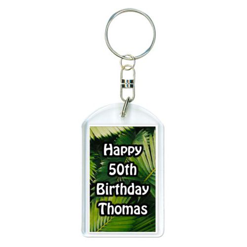 Personalized plastic keychain personalized with plants fern pattern and the saying "Happy 50th Birthday Thomas"
