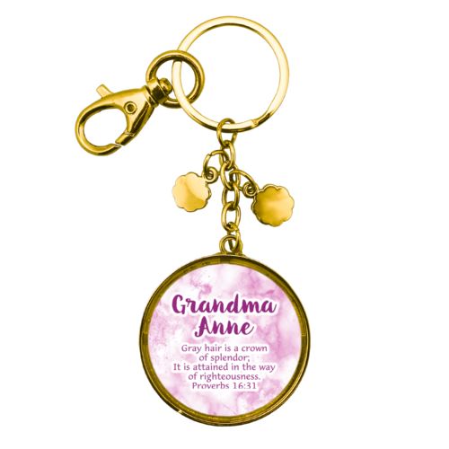 Personalized keychain personalized with pink marble pattern and the saying "Grandma Anne Gray hair is a crown of splendor; It is attained in the way of righteousness. Proverbs 16:31"