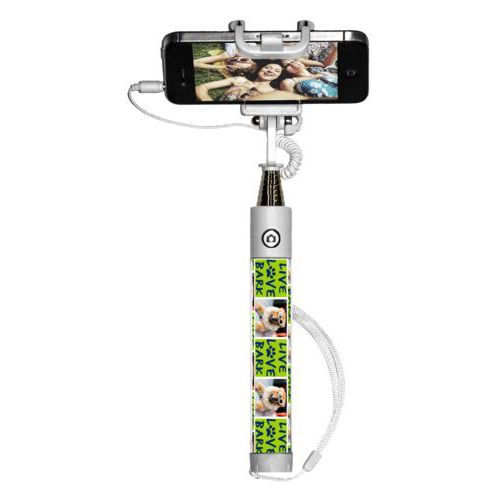 Personalized selfie stick personalized with a photo and the saying "Live love bark" in navy blue and juicy green
