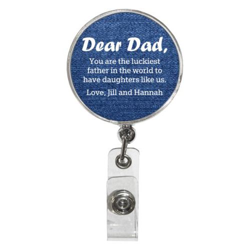 Personalized badge reel personalized with denim industrial pattern and the saying "Dear Dad, You are the luckiest father in the world to have daughters like us. Love, Jill and Hannah"