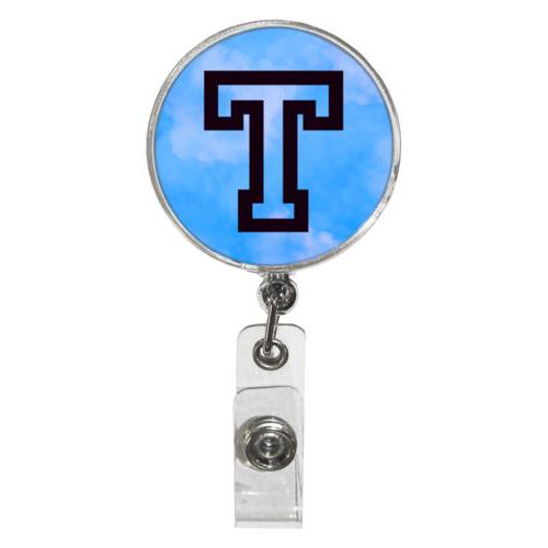 Personalized badge reel personalized with light blue cloud pattern and the saying "T"