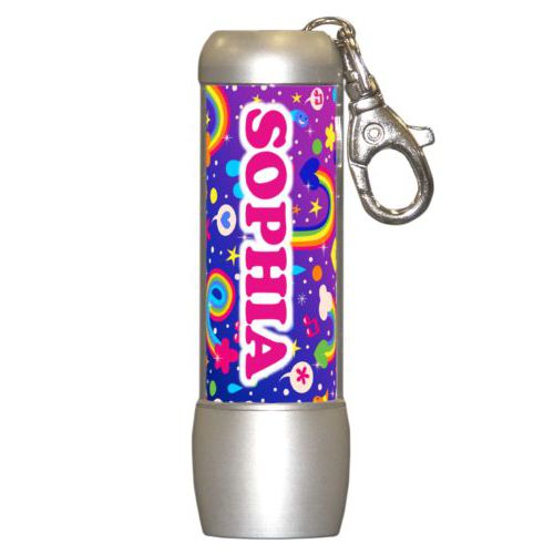 Personalized flashlight personalized with rainbows pattern and the saying "SOPHIA"