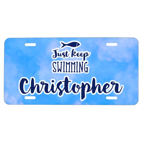 Custom license plate personalized with light blue cloud pattern and the sayings "Just Keep Swimming" and "Christopher"