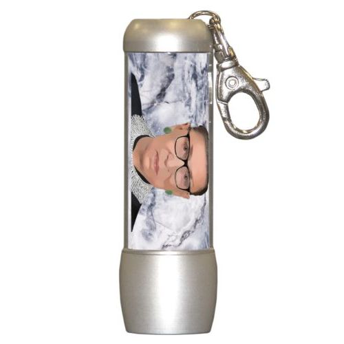Small bright personalized flasklight personalized with Ruth Bader Ginsburg drawing and "Notorious RGB" on marble design