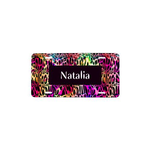 Custom car plate personalized with cheetah pattern and name in black licorice