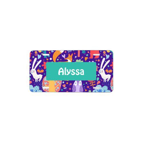 Custom license plate personalized with forest pattern and name in minty