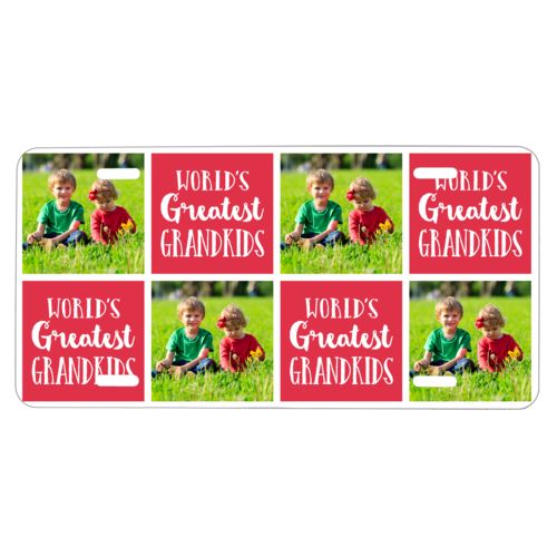 Custom car plate personalized with a photo and the saying "World's Greatest Grandkids" in cherry red and white
