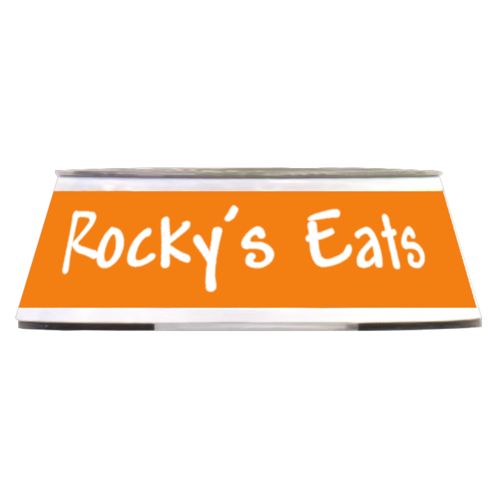 Personalized pet bowl personalized with the saying "Rocky's Eats" in juicy orange and white