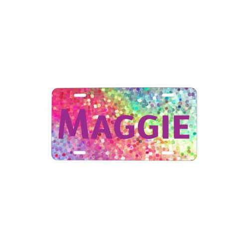 Vanity front license plate personalized with glitter pattern and the saying "Maggie"