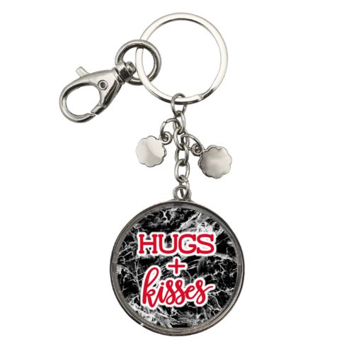 Personalized metal keychain personalized with onyx pattern and the saying "hugs and kisses"