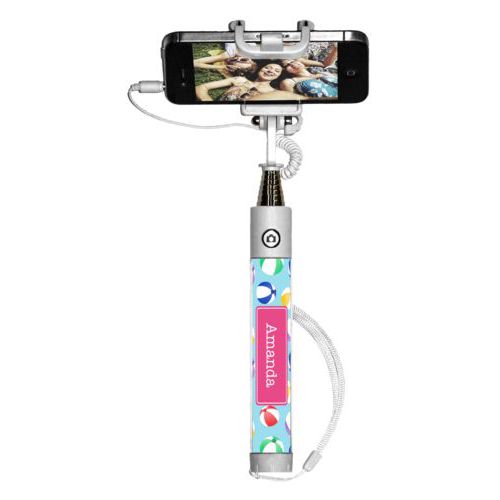 Personalized selfie stick personalized with beach balls pattern and name in bubblegum pink