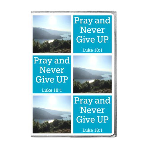 Personalized journal personalized with a photo and the saying "Pray and Never Give UP Luke 18:1" in juicy blue and white