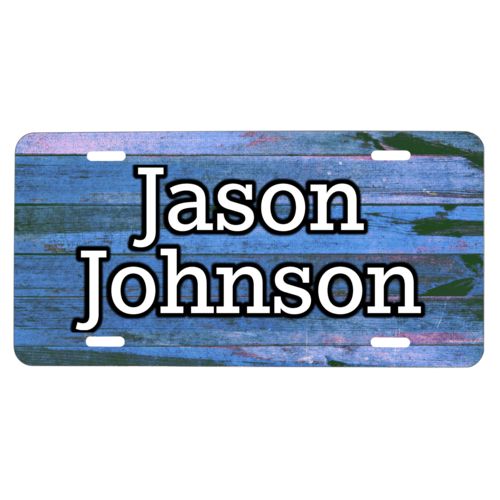 Personalized car tag personalized with sky rustic pattern and the saying "Jason Johnson"