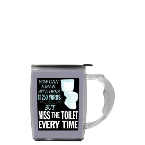 Custom mug with handle personalized with the saying "How can a man hit a deer at 250 yards but keeps missing the toilet"