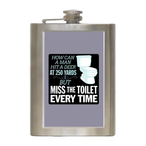 Personalized 8oz flask personalized with the saying "How can a man hit a deer at 250 yards but keeps missing the toilet"