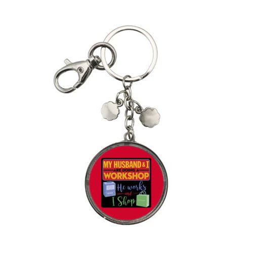 Personalized keychain personalized with the saying "My husband and I are doing a workshop, he works and I shop"