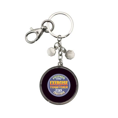 Personalized keychain personalized with the saying "Friends that exercise together stay together"