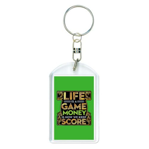 Personalized plastic keychain personalized with the saying "Life is a game, money is how we keep score"