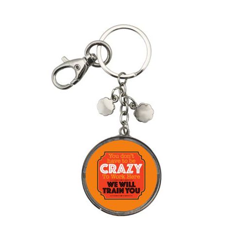 Personalized keychain personalized with the saying "You don't have to be crazy to work here, we will train you"