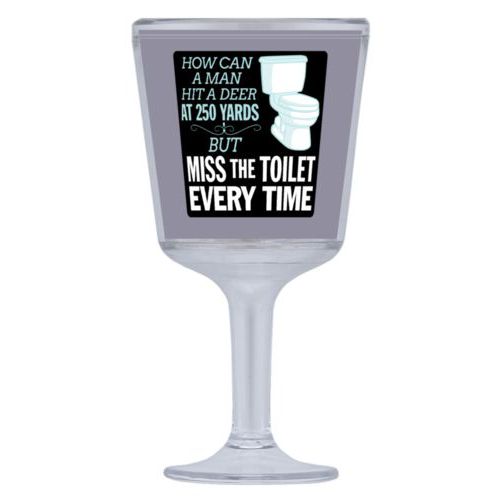 Personalized wine cup with straw personalized with the saying "How can a man hit a deer at 250 yards but keeps missing the toilet"