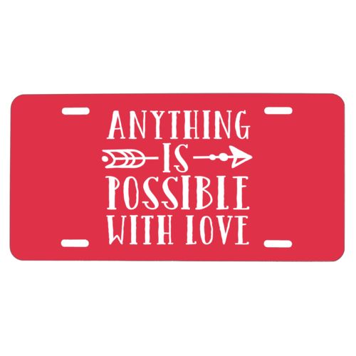 Custom license plate personalized with the saying "anything is possible with love"