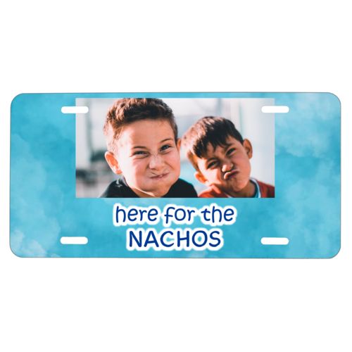 Custom license plate personalized with teal cloud pattern and photo and the saying "here for the Nachos"