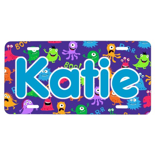 Custom license plate personalized with monsters pattern and the saying "Katie"