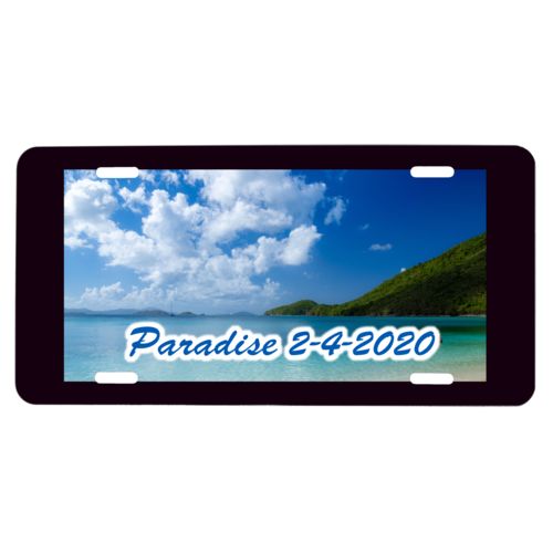 Custom car plate personalized with photo and the saying "Paradise 2-4-2020"