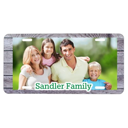 Personalized car tag personalized with grey wood pattern and photo and the saying "Sandler Family"