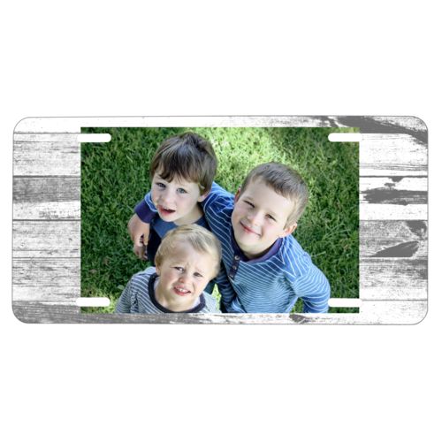 Custom license plate personalized with white rustic pattern and photo