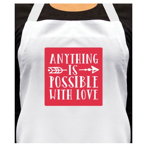 Personalized apron personalized with the saying "anything is possible with love"