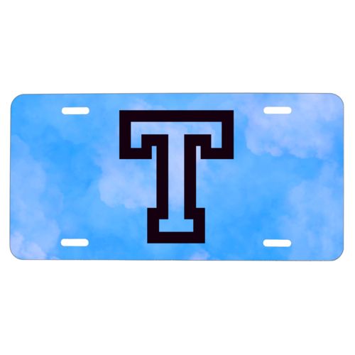 Custom license plate personalized with light blue cloud pattern and the saying "T"