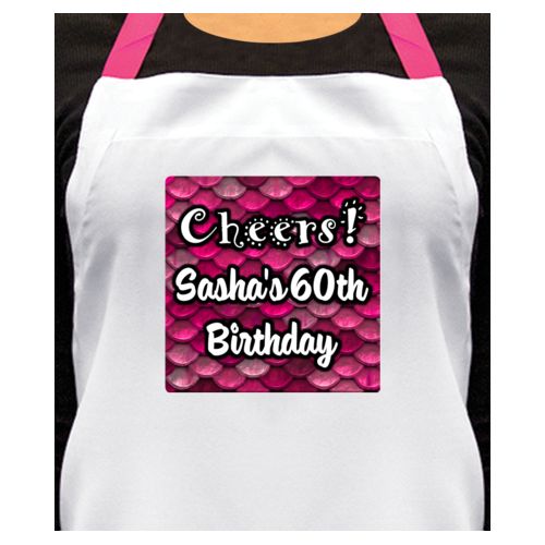 Personalized apron personalized with pink mermaid pattern and the saying "Cheers! Sasha's 60th Birthday"