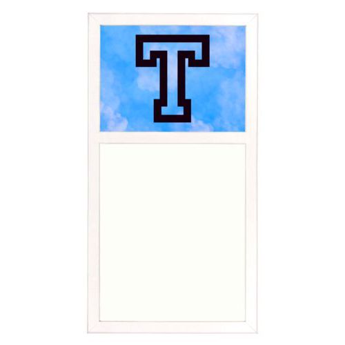 Personalized white board personalized with light blue cloud pattern and the saying "T"