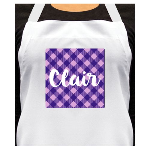 Personalized apron personalized with check pattern and the saying "Clair"