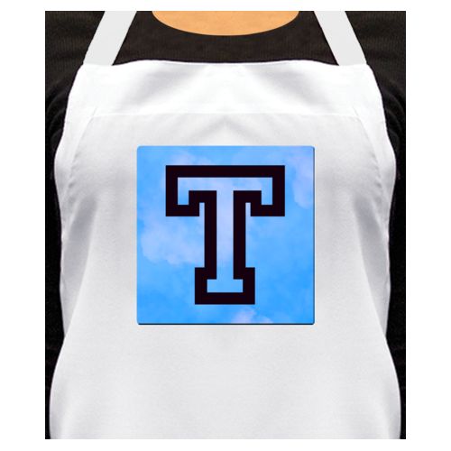 Personalized apron personalized with light blue cloud pattern and the saying "T"