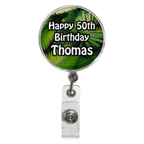 Personalized badge reel personalized with plants fern pattern and the saying "Happy 50th Birthday Thomas"