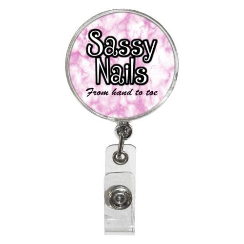 Personalized badge reel personalized with pink marble pattern and the sayings "Sassy Nails" and "From hand to toe"