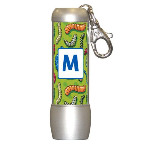 Personalized flashlight personalized with worms pattern and initial in cosmic blue