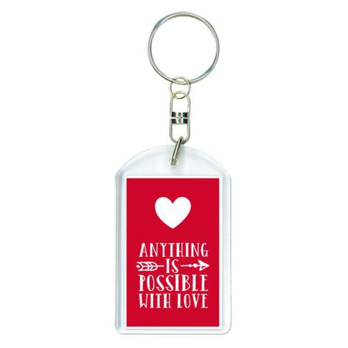 Personalized keychain personalized with the sayings "anything is possible with love" and "heart"