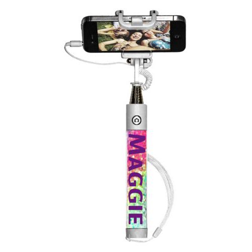 Personalized selfie stick personalized with glitter pattern and the saying "Maggie"