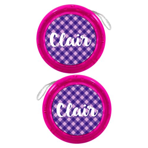 Personalized yoyo personalized with check pattern and the saying "Clair"
